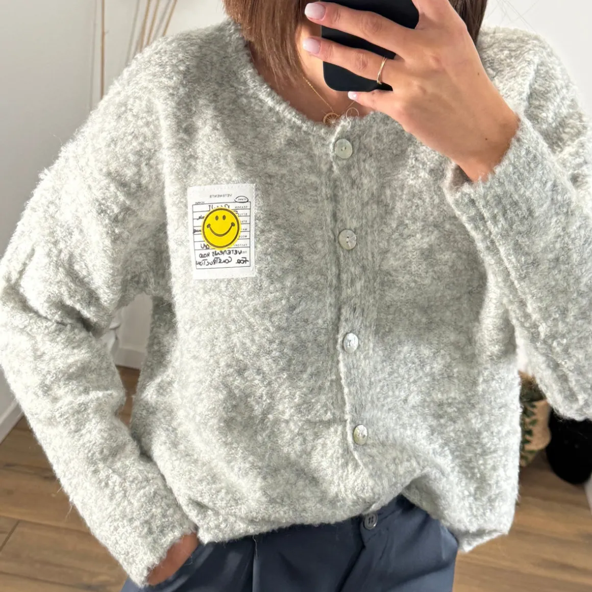 PULL GRIS SMILEY